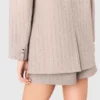 Blazer de fato às riscas com strass