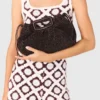Bolsa de mão Mipli com efeito bouclé