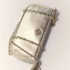 Bolsa de mão Sarah em couro metalizado