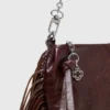 Bolsa Miss M Pouch em couro envernizado