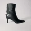 Botas de cano curto em pele