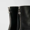 Botas de cano curto em pele