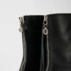 Botas de cano curto em pele