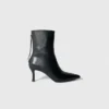 Botas de cano curto em pele