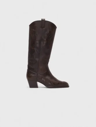 Botas de cowboy em pele