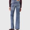 Calças de ganga bootcut com bolsos com fecho