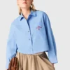 Camisa bordada com costas plissadas