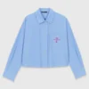 Camisa bordada com costas plissadas
