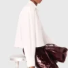 Camisa curta com detalhe de joia