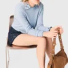 Camisola com laços com joias nas costas