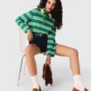 Camisola polo curta às riscas