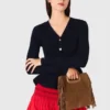 Casaco com peplum na cintura