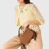 Casaco de croché com strass