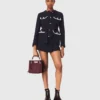 Casaco de tweed com 4 bolsos