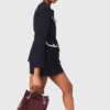 Casaco de tweed com 4 bolsos