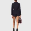 Casaco de tweed com 4 bolsos