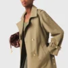 Casaco trench com tachas