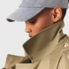 Casaco trench com tachas