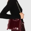 Mala M Mini Bag em couro envernizado