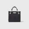 Mini bolsa de couro acolchoada