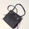 Mini bolsa de couro acolchoada