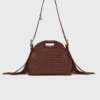 Mini-bolsa de couro com tachas Miss M