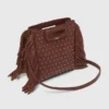 Mini-bolsa M em pele com tachas