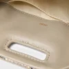 Mini-bolsa Miss M com relevo de pitão