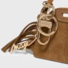 Mini-charm de bolsa com espelho Miss M