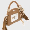 Mini-charm de bolsa com espelho Miss M