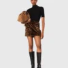 Mini-saia em pele sintética com padrão leopardo