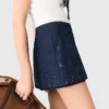 Saia-calça de ganga bordada com efeito em camadas
