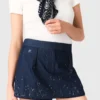 Saia-calça de ganga bordada com efeito em camadas