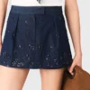 Saia-calça de ganga bordada com efeito em camadas