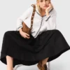 saia maxi com cintura contrastante