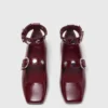 Sapatilhas Mary Jane em couro com tachas