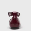 Sapatilhas Mary Jane em couro com tachas
