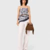 Top com estampado de frutas e smock