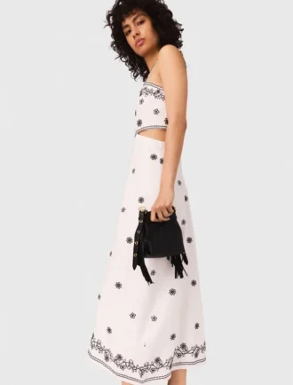 Vestido maxi com recortes bordados
