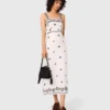Vestido maxi com recortes bordados