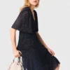Vestido midi com folhos metálicos
